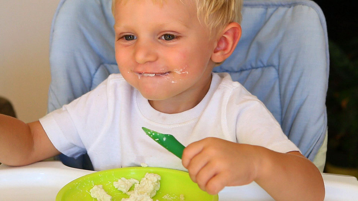 OlaSprout is the perfect baby spoon for eating creamy rice with parmesan cheese