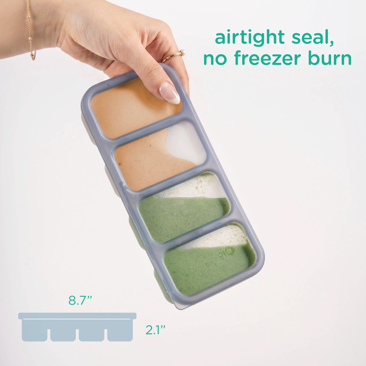 A hand holds a silicone freezer tray with four compartments containing frozen gel cubes, with text reading 'airtight seal, no freezer burn' and size callouts showing 8.7 inches by 2.