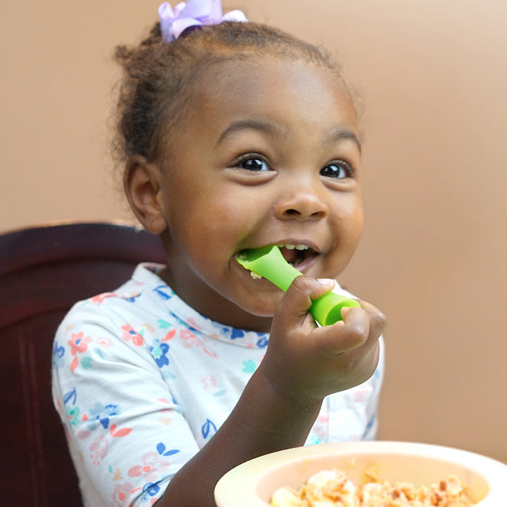 Solid Feeding Stage - Training spoon in use