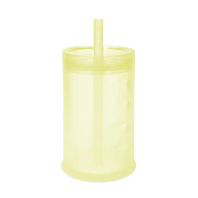 A lemon Olababy training cup on white with its lid and straw, the straw visible through the wall of the cup.